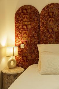 Appartements Suite Meraki - Luxe & Voyage - Jacuzzi & Cinema : photos des chambres