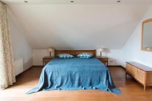 Rožių namas ant jūros kranto