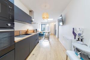 Appartements LE TOPAZE Wifi Patio Centre-ville : photos des chambres