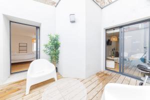 Appartements LE TOPAZE Wifi Patio Centre-ville : photos des chambres