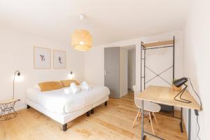 Appartements LE TOPAZE Wifi Patio Centre-ville : photos des chambres