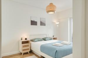 Flat w Balcony & Workspace by HostWise