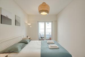 Flat w Balcony & Workspace by HostWise