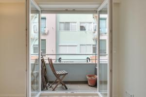 Flat w Balcony & Workspace by HostWise