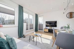 Nowoczesny Rodzinny Apartament z Klimatyzacją i Parkingiem w Krakowie by Renters Prestige