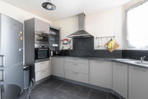 Appartements Emile Zola Asniere - KP -Spacious apt for 6 with porch Asniere sur Seine : photos des chambres