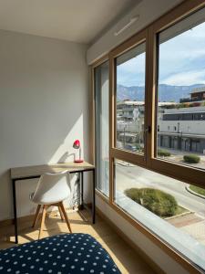 Appartements La parenthese du lac - Lake view and private parking : photos des chambres