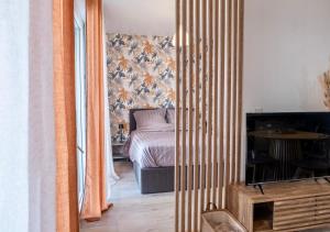Appartements Entre Paris et Disneyland avec charme interieur : photos des chambres