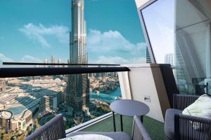4BR Luxury Apartment with Burj Khalifa View and Direct Dubai Mall Access - Pool and PS5 Included - 4hvězdičkové hotely ve městě Dubaj