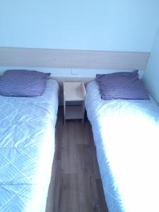 Bungalow Natherem, 3ch dont 1 suite parentale, 2 sdb à Saint Julien en Born dans camping 4 étoile