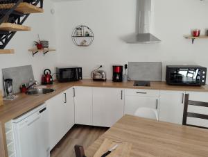 Maison Les Iris - 2 chambres et 2 salles de bain - 2 à 4 personnes - Futuroscope