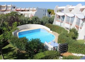 Charmant studio en bord de mer, piscine, climatisation, parking privé et wifi