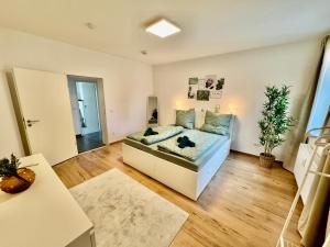 FeWo-Palmtrees 3 - Große und moderne 2 Zimmerwohnung mit Süd-West Balkon in Gladbeck-Mitte nähe Movie Park und Arena AufSchalke