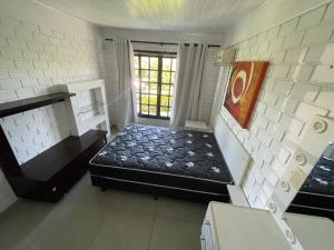 Nossa casa com muito verde no Rosa