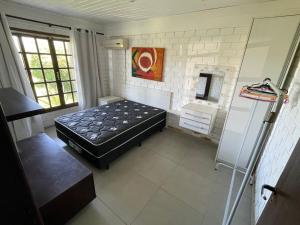 Nossa casa com muito verde no Rosa