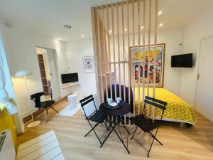 Appartements Le GOLDORAK - Hypercentre, parking prive et climatisation : photos des chambres