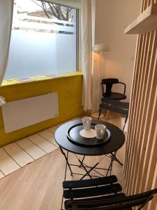 Appartements Le GOLDORAK - Hypercentre, parking prive et climatisation : photos des chambres