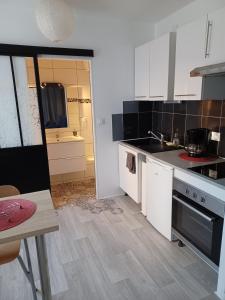 Appartements Studio neuf confortable a 10 min a pied de la gare : photos des chambres