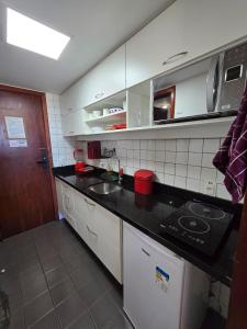 Flat Decorado com Piscina e Pier