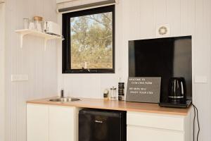 Gem on the Hill by Tiny Away