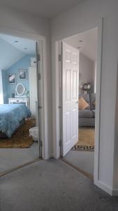 Village life- Private Attic Suite - Living Room, Bedroom and Bathroom