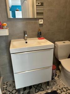 Appartements Studio cosy de Luc : photos des chambres