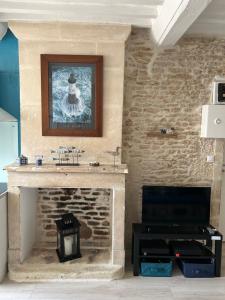 Appartements Studio cosy de Luc : photos des chambres