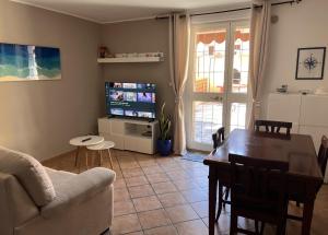 Un passo dal Mare - 50m from the Sea, with Garden, AC & WiFi