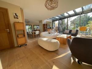 Glass and wood designer villa with garden in centertown