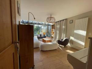 Glass and wood designer villa with garden in centertown