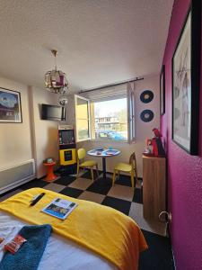 Appartements Insolite Les annees 80 ! : photos des chambres