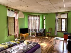 King Studio with Sofa Bed room in 4 Rooms