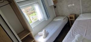 Maisons de vacances Cosy mobil home 3Ch en foret, parking inclus, plage a 15mn a pied : photos des chambres