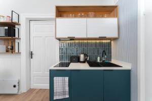 Blue Den Old Town Apartments