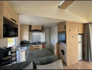 Appartements Mobil Home 6 pers - 256 Camping Siblu Le Lac des Reves, Lattes : photos des chambres