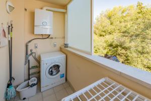 Duplex Three-Bedroom Apartment with Sea View room in InSitges Sant Sebastia's Beach
