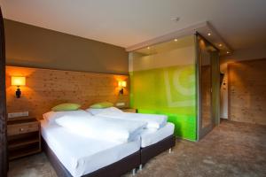 Small Superior Double Room with Balcony room in Hotel Bäckelar Wirt Superior