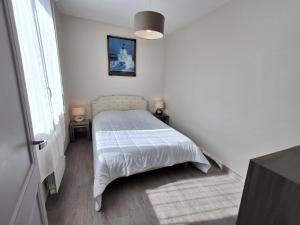 Maisons de vacances Maison plain-pied Chatelaillon-Plage a 500m de l-ocean pour 6 pers, jardin, barbecue - FR-1-706-37 : photos des chambres