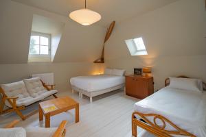 Villas Narcisse Bienvenue - Elegance et Raffinement : photos des chambres