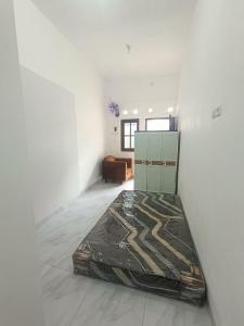 Kamar Kost AC Luas Tengah Kota