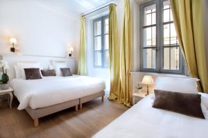 Hotels Les Quatre Dauphins : photos des chambres