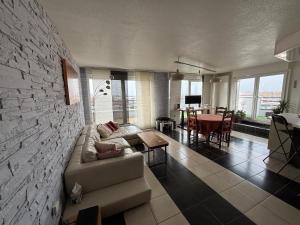 Appartements Attique avec terrasse - Zenith & centre-ville : photos des chambres