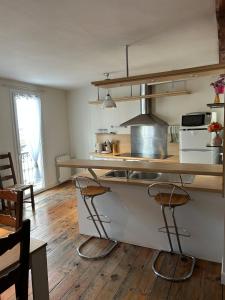 Appartements Maison triplex centre de Lourdes : photos des chambres