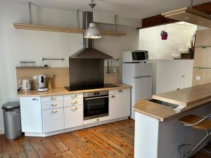 Appartements Maison triplex centre de Lourdes : photos des chambres