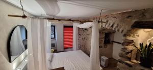 Maisons de vacances Gite de village 2p, terrasse de toit et jacuzzi privatif : photos des chambres