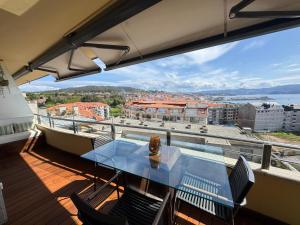 Sanxenxo, Apartamento 1 hab con vistas al mar, piscina, garaje y a 150 mts de la Playa Silgar