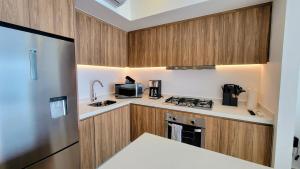 Vista Azul Sleek beachfront 1-bedroom condo with stunning bay views