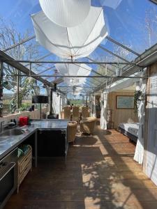 Vrijstaande accommodatie Glamping de Kas InN