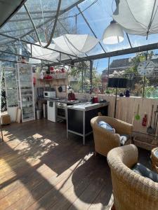 Vrijstaande accommodatie Glamping de Kas InN