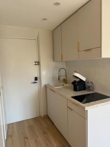 Appartements Elegant studio between train station and city center : photos des chambres
